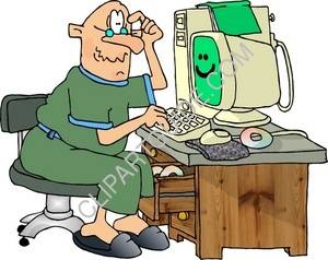 An Old Man Operating a Computer